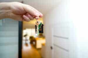 Buyer receiving the keys to a new home before completing the home buying process in Middle Georgia.