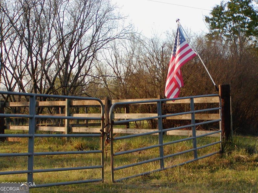 Gated entrance to 852 Union Hill Church Road in Hillsboro GA