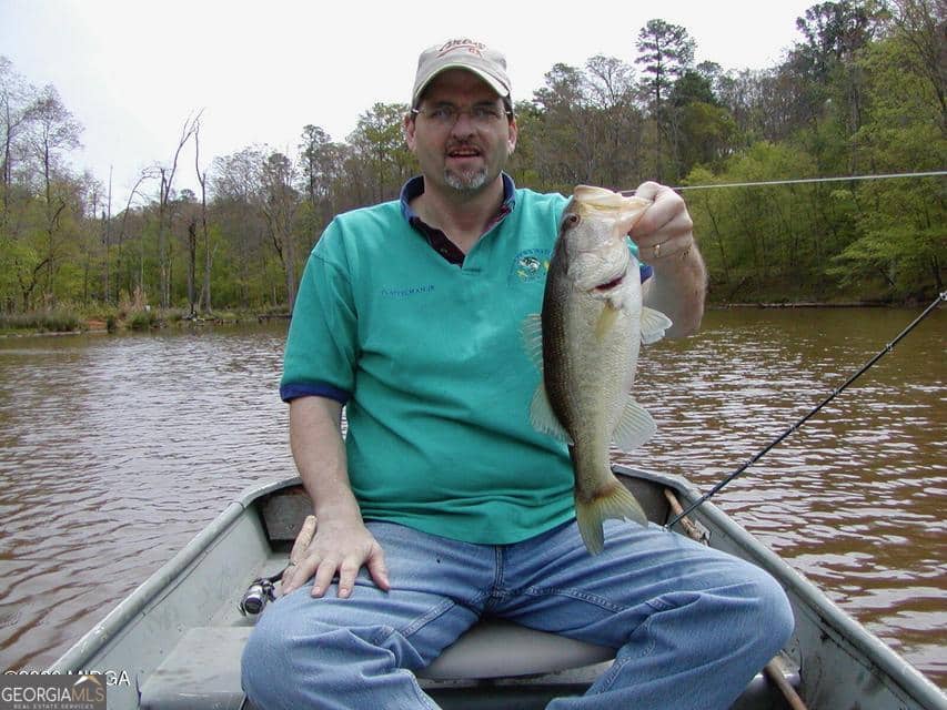 Fishing on the pond at 852 Union Hill Church Road in Hillsboro GA